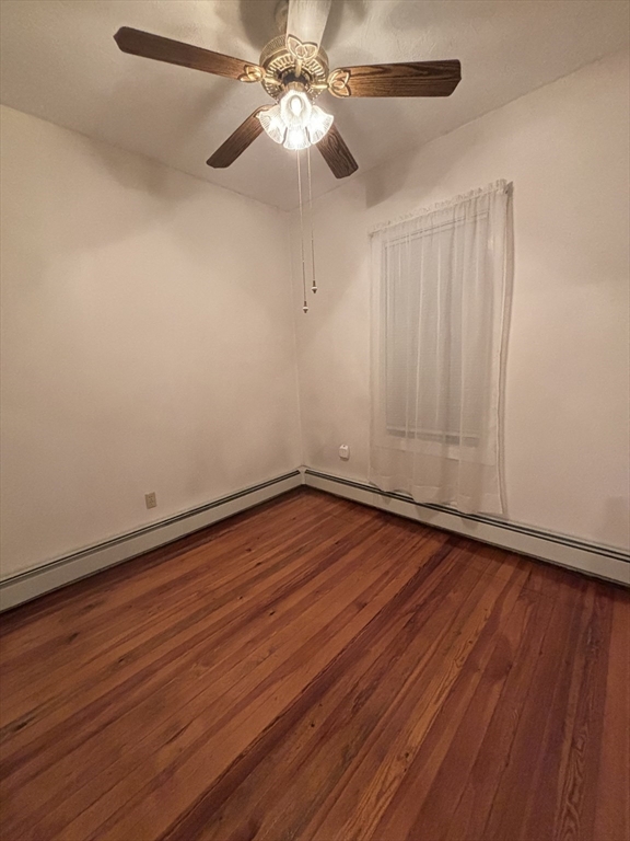 47 Middle Street, Unit 2 Boston, MA 02127 - Photo 5 of 13 wooden floor in an empty room