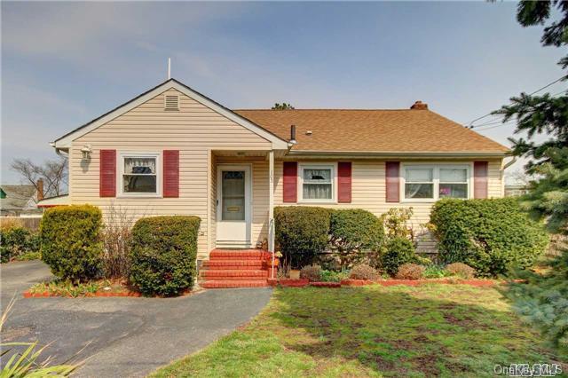 105 Bethpage Road Hicksville, NY 11801 - Photo 1 of 1 a front view of a house with a yard