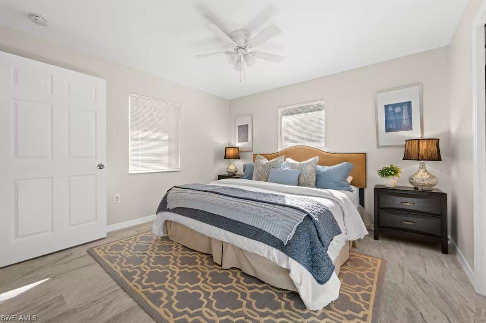 2715 Lee Street Punta Gorda, FL 33950 - Photo 20 of 50 a bedroom with a bed and window