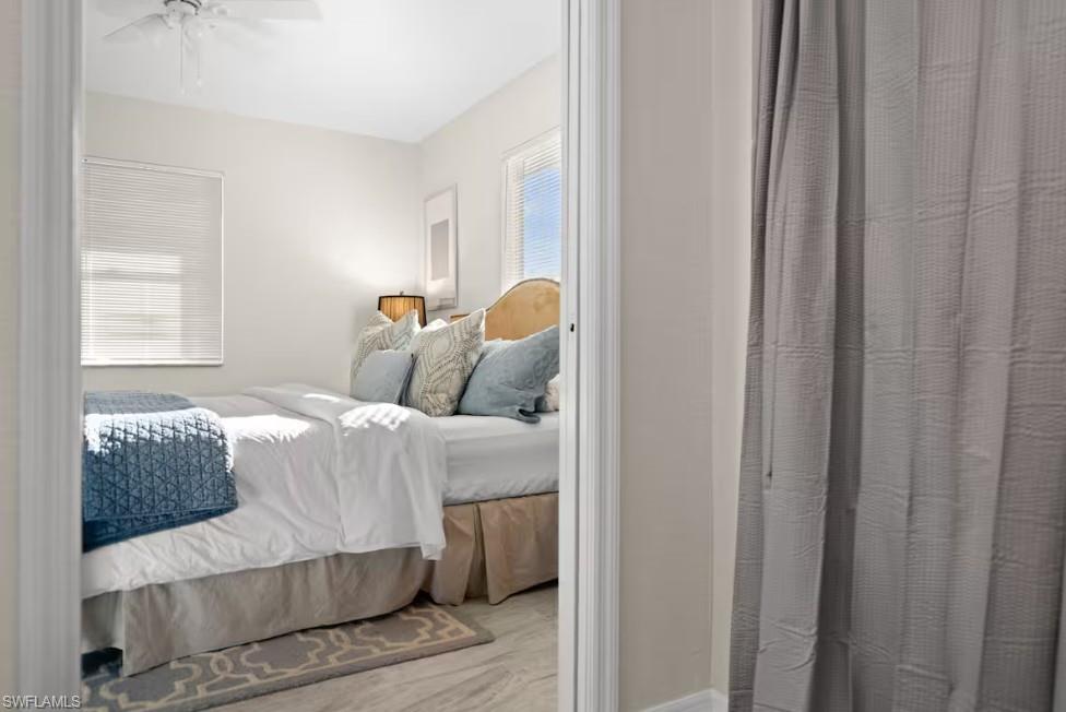 2715 Lee Street Punta Gorda, FL 33950 - Photo 23 of 50 a bedroom with a bed and a window