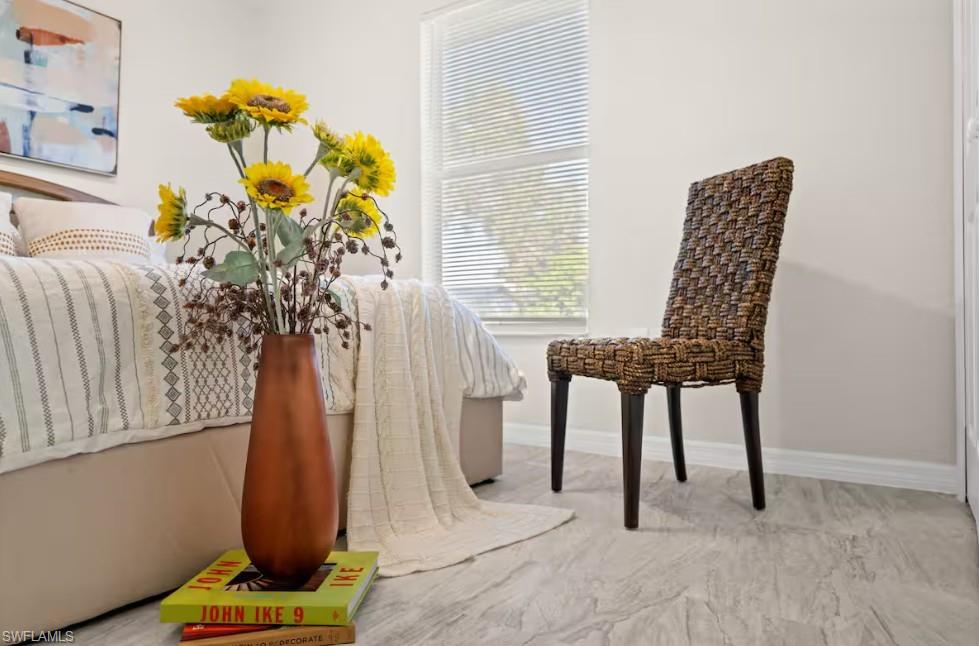 2715 Lee Street Punta Gorda, FL 33950 - Photo 26 of 50 a dining room with furniture and a chandelier