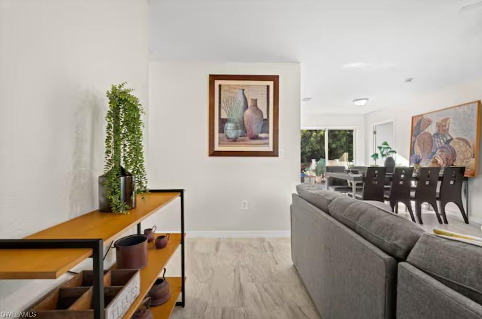 2715 Lee Street Punta Gorda, FL 33950 - Photo 3 of 50 a living room with furniture and a wooden floor