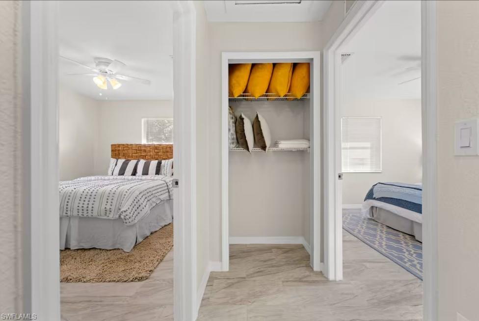 2715 Lee Street Punta Gorda, FL 33950 - Photo 39 of 50 a bedroom with a bed and a television