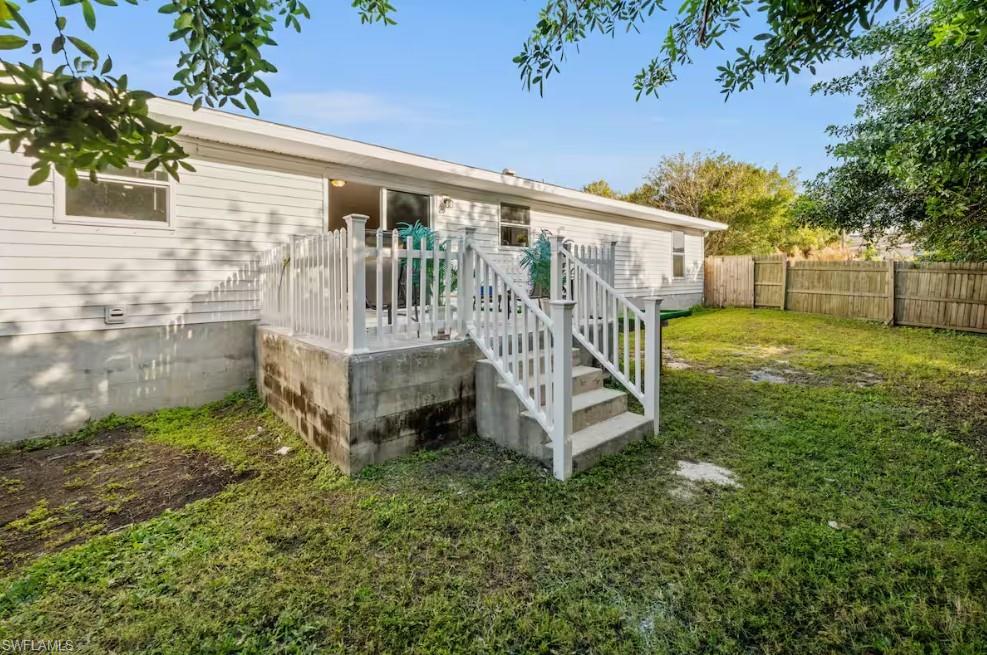 2715 Lee Street Punta Gorda, FL 33950 - Photo 50 of 50 a view of a porch with a yard