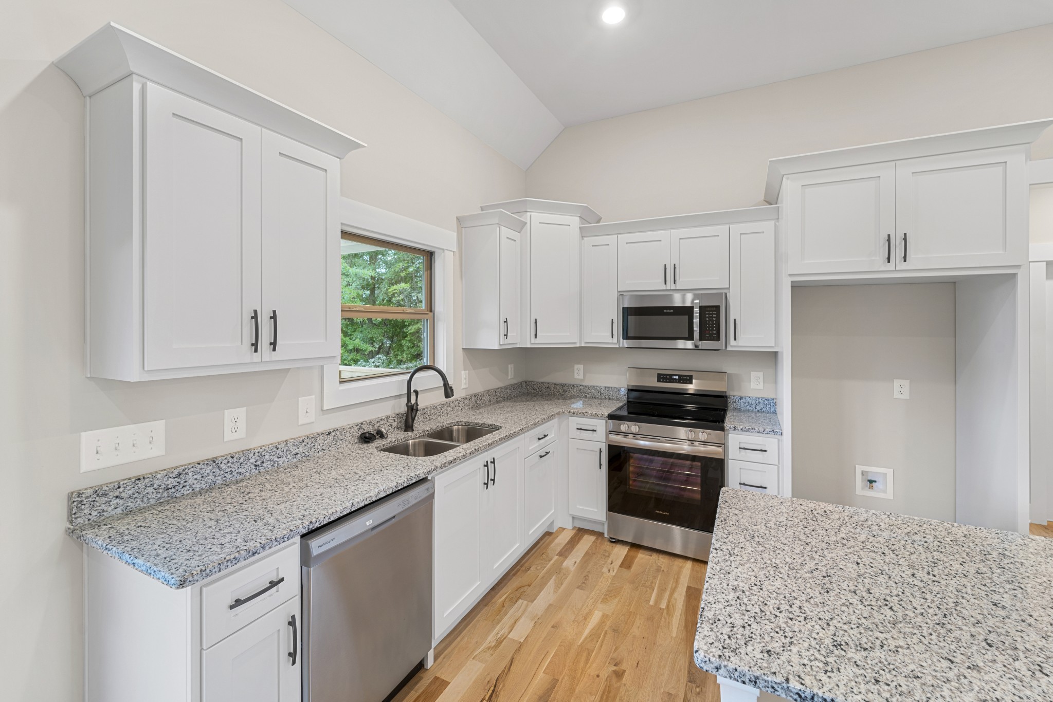 5751 Lakeview Road Springfield, TN 37172 - Photo 11 of 28 a kitchen with stainless steel appliances granite countertop a sink stove microwave and refrigerator