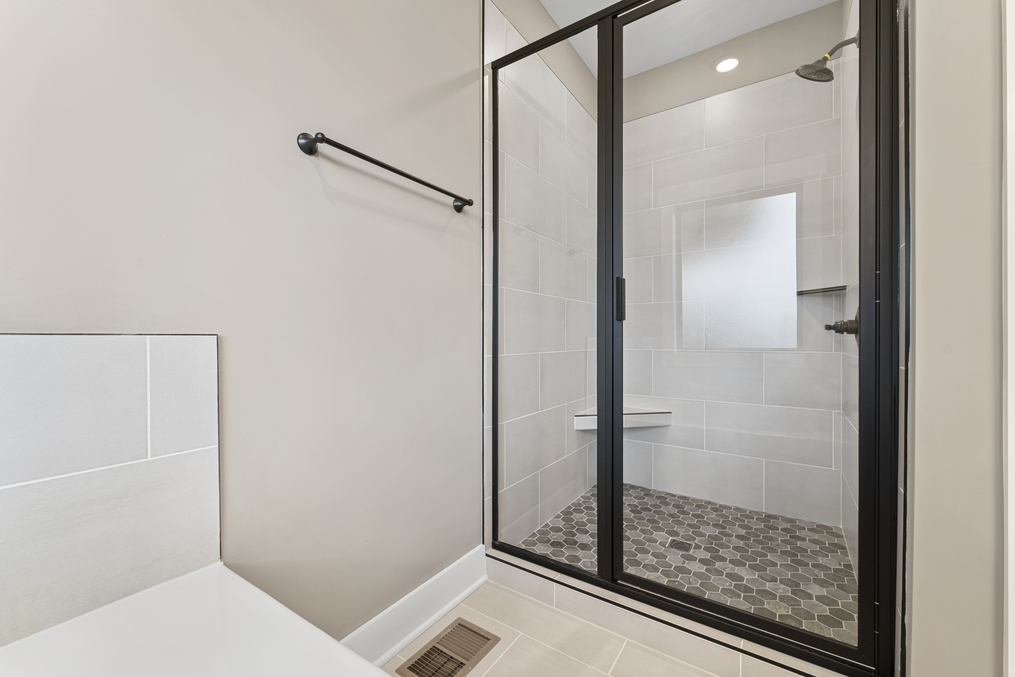 5751 Lakeview Road Springfield, TN 37172 - Photo 17 of 28 a bathroom with a glass shower door