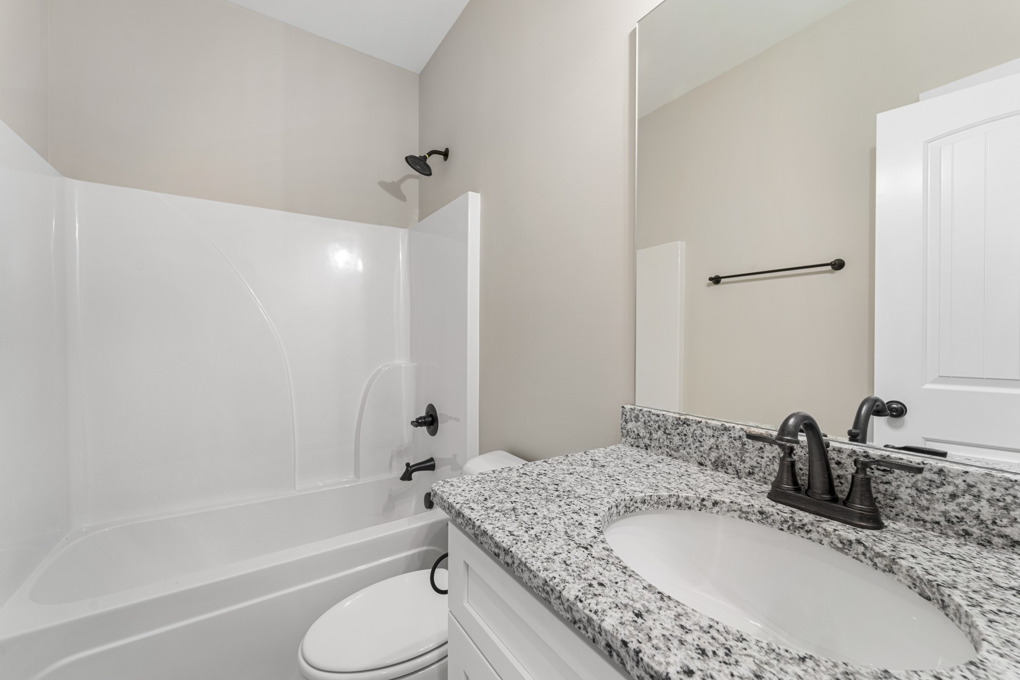 5751 Lakeview Road Springfield, TN 37172 - Photo 23 of 28 a bathroom with a granite countertop sink toilet and shower