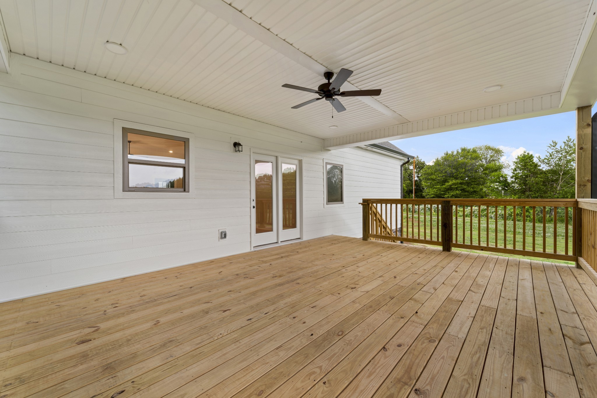 5751 Lakeview Road Springfield, TN 37172 - Photo 4 of 28 a view of a deck with wooden floor and flat screen tv