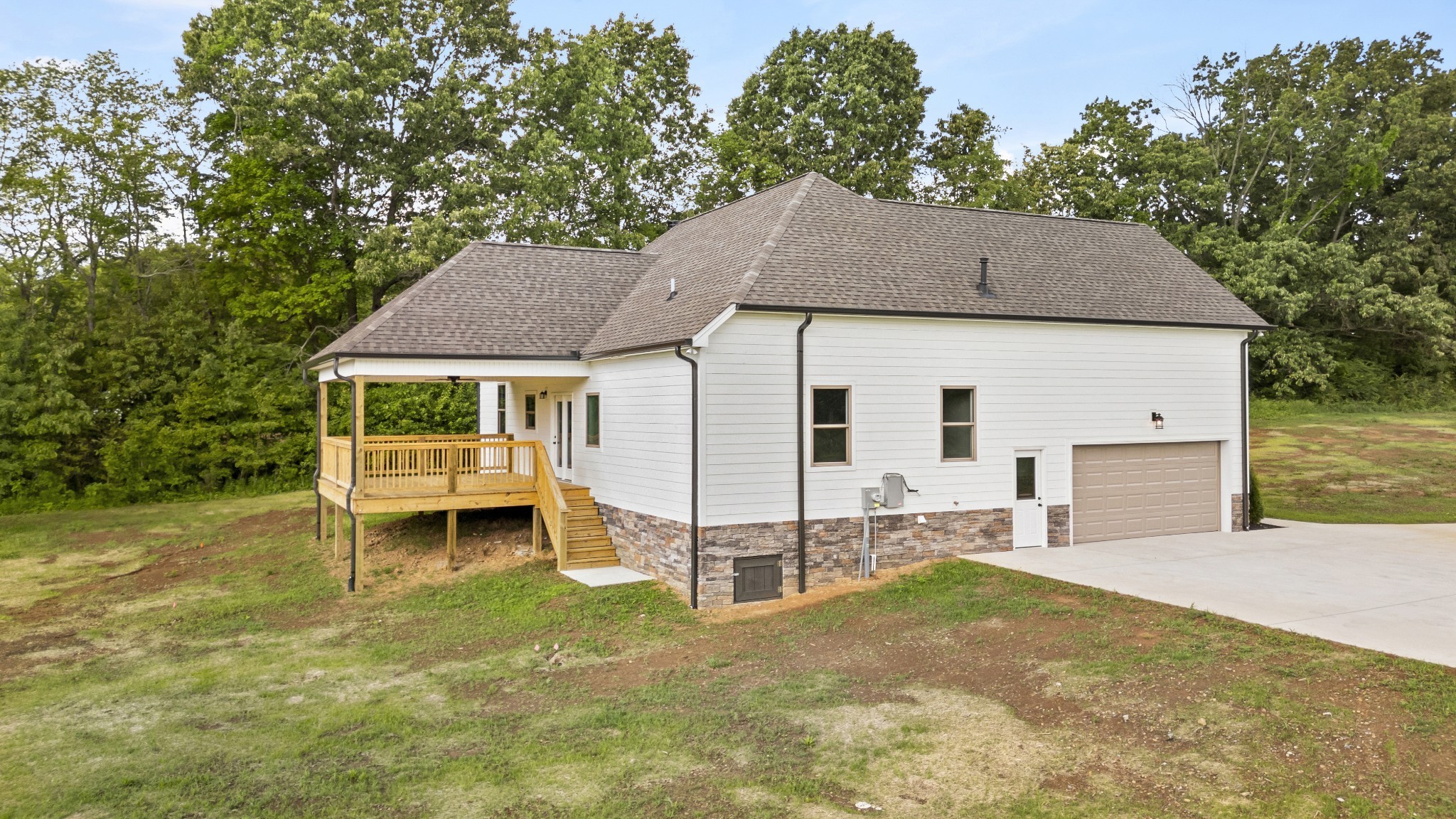5751 Lakeview Road Springfield, TN 37172 - Photo 5 of 28 a view of a house with backyard and a tree