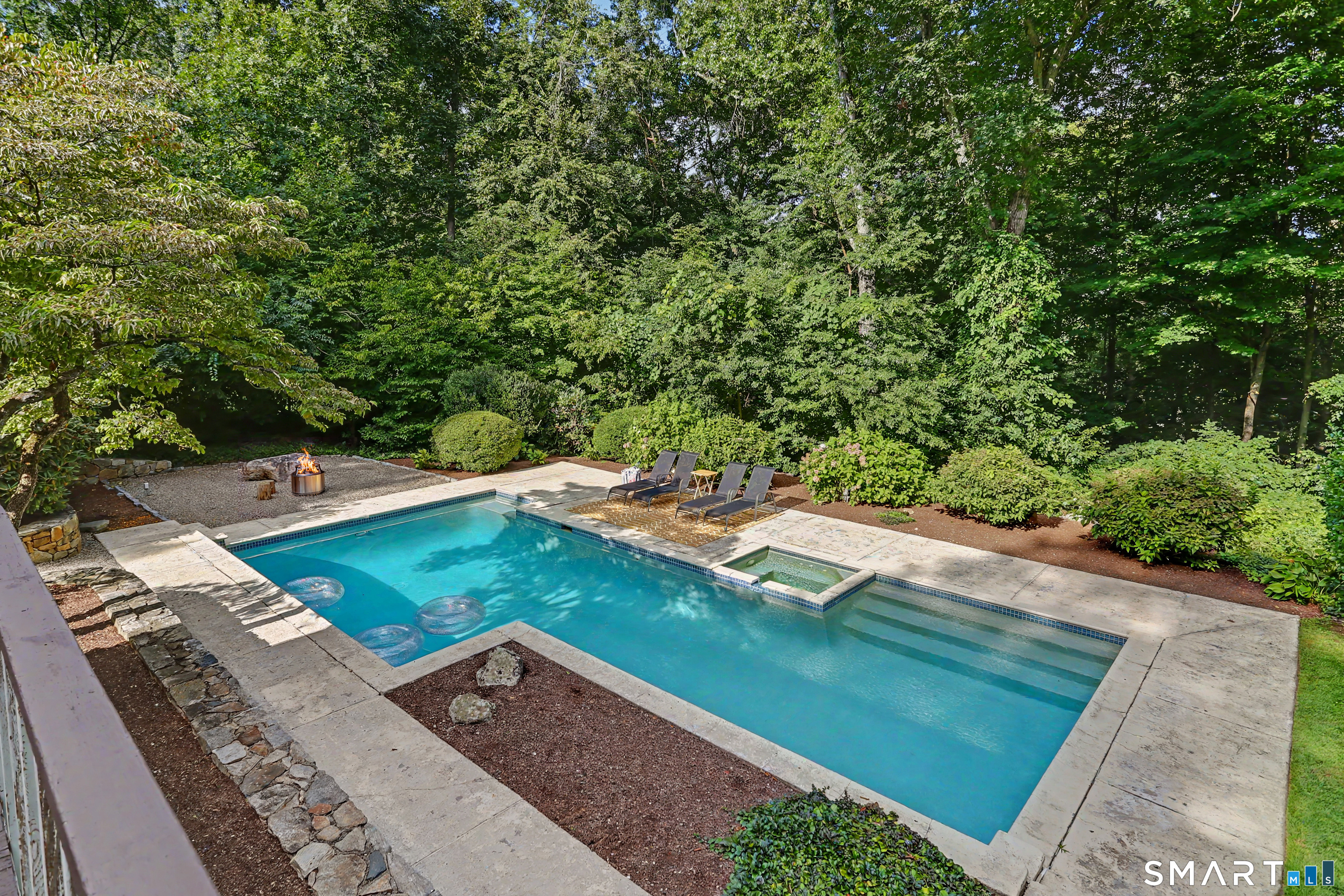 9 Autumn Ridge Road Weston, CT 06883 - Photo 31 of 40 The heated gunite pool and spa are a dream.