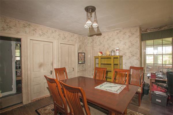 875 A Horseneck Road Westport, MA 02790 - Photo 22 of 30 a view of a dining room with furniture window and outside view