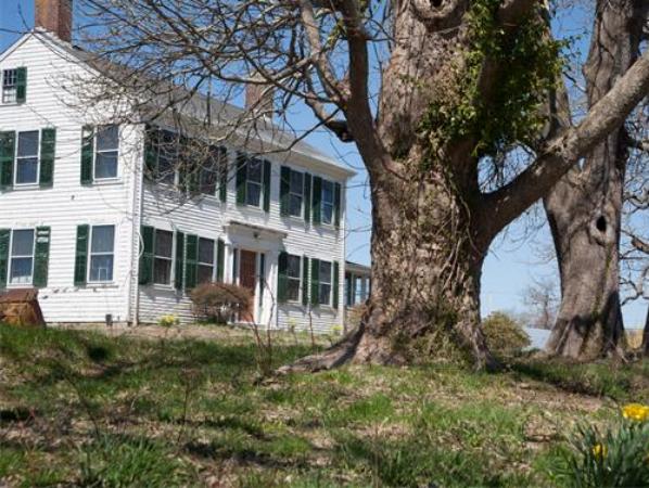 875 A Horseneck Road Westport, MA 02790 - Photo 3 of 30 a front view of a house with garden