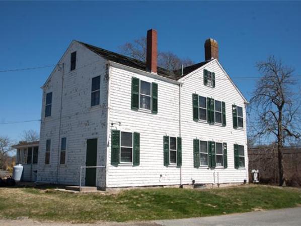 875 A Horseneck Road Westport, MA 02790 - Photo 5 of 30 a front view of a house with a yard