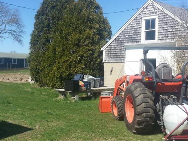 875 A Horseneck Road Westport, MA 02790 - Photo 10 of 30 a backyard of a house with table and chairs
