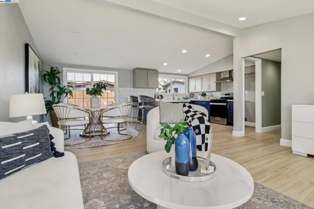 a kitchen with a table and chairs in it