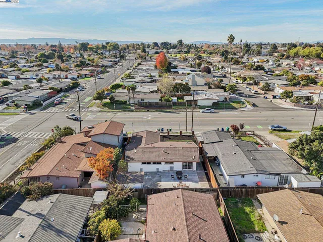 an aerial view of a city with lots of residential buildings