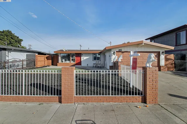a front view of a house with a porch
