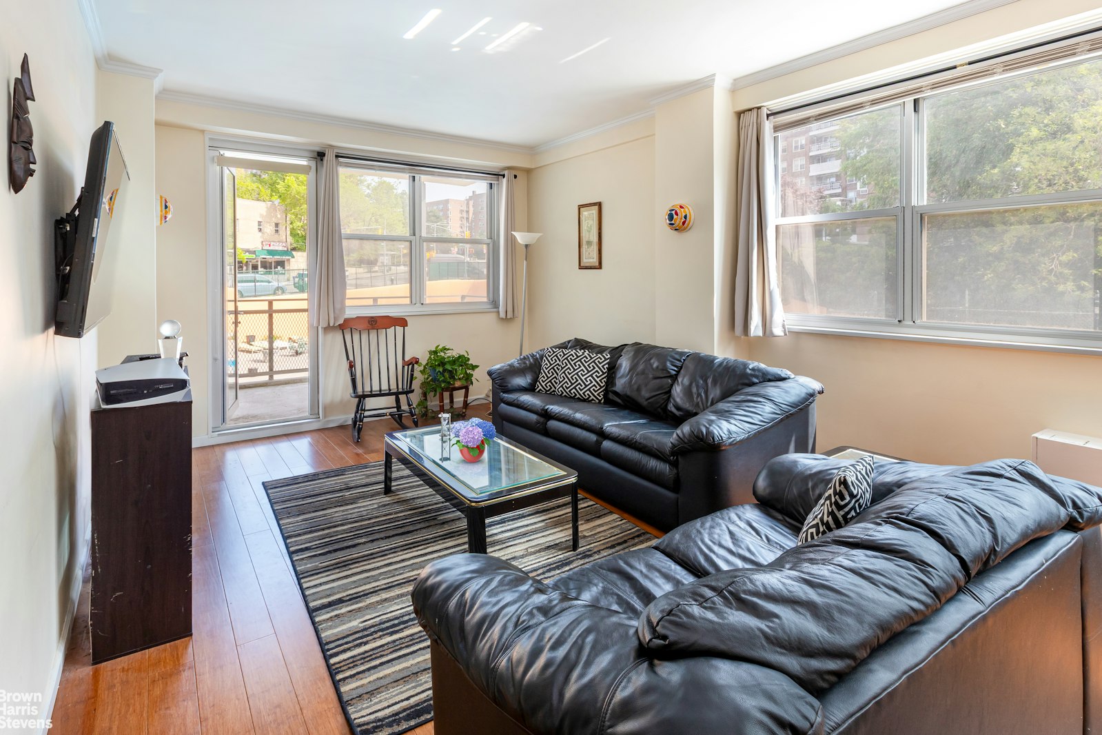 555 Kappock Street, Unit 2E Bronx, NY 10463 - Photo 23 of 39 a living room with furniture and a flat screen tv