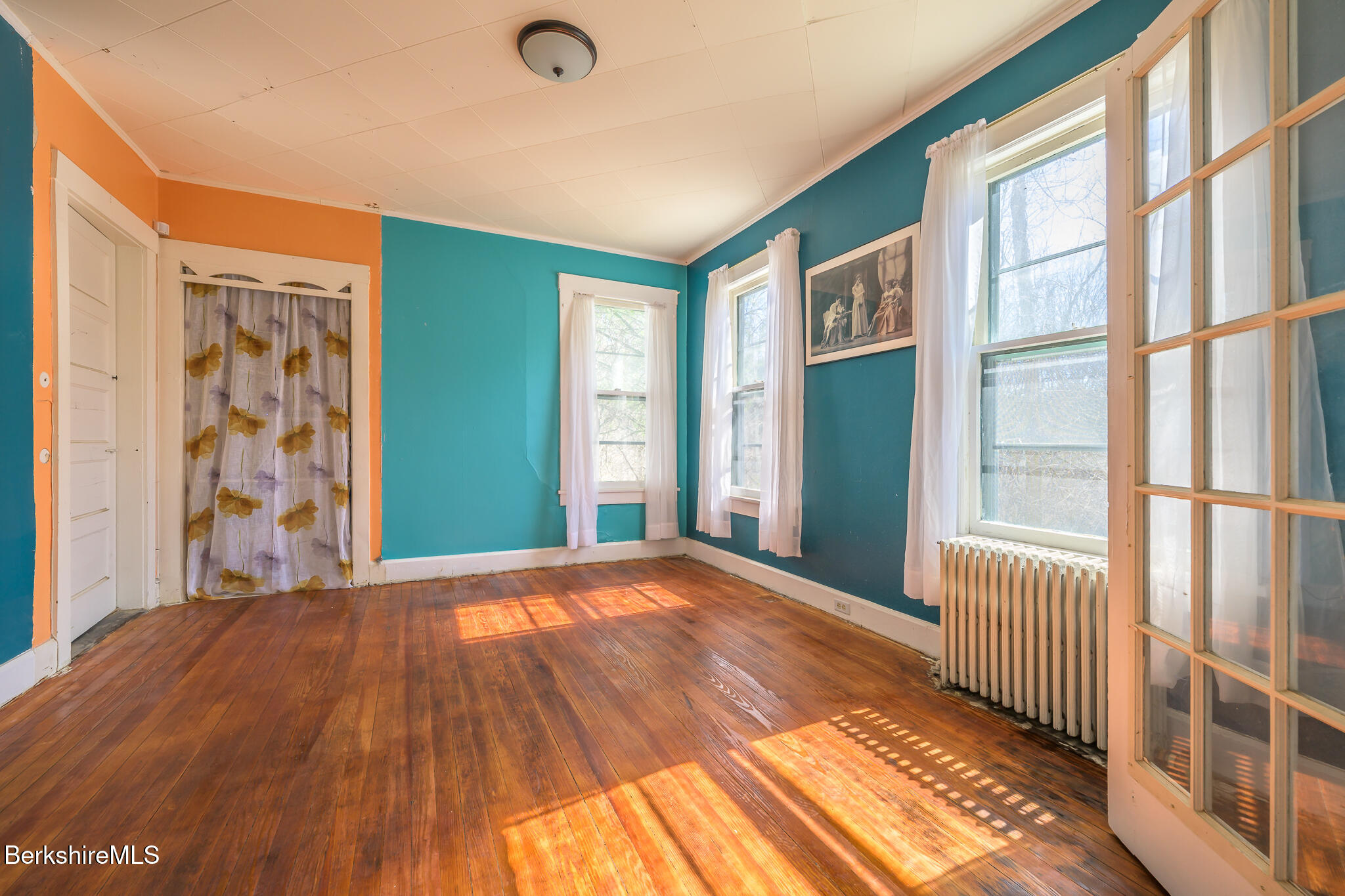 6 East Street Stockbridge, MA 01262 - Photo 10 of 23 a view of an empty room with wooden floor and a window