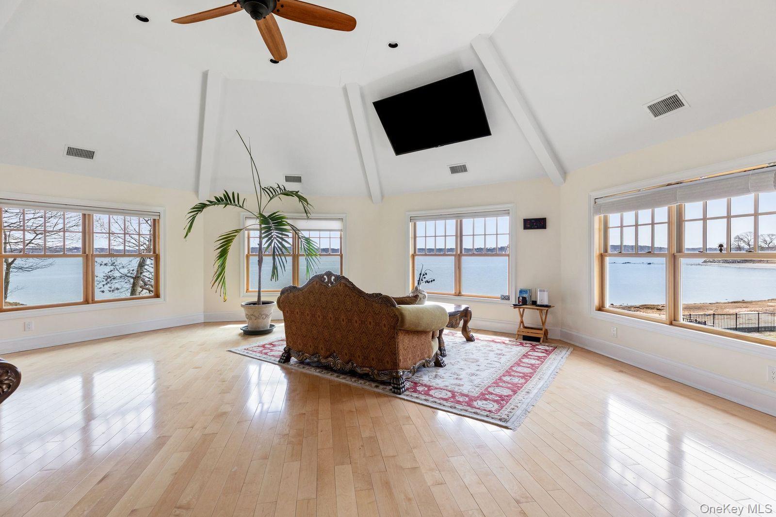 33 Beach Road Northport, NY 11768 - Photo 20 of 50 a living room with furniture and a flat screen tv