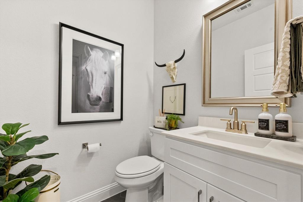 2603 Trinity Ridge Street Mansfield, TX 76063 - Photo 32 of 39 Half bath serves game and media rooms