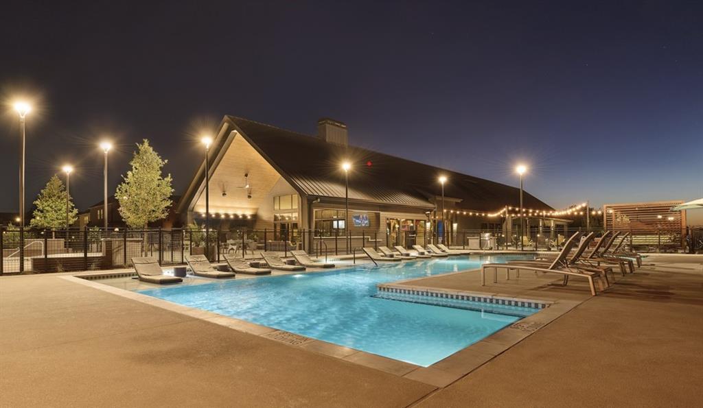 1525 Fm 982, Unit 3214 Princeton, TX 75407 - Photo 20 of 26 Pool at twilight featuring a patio and a community pool