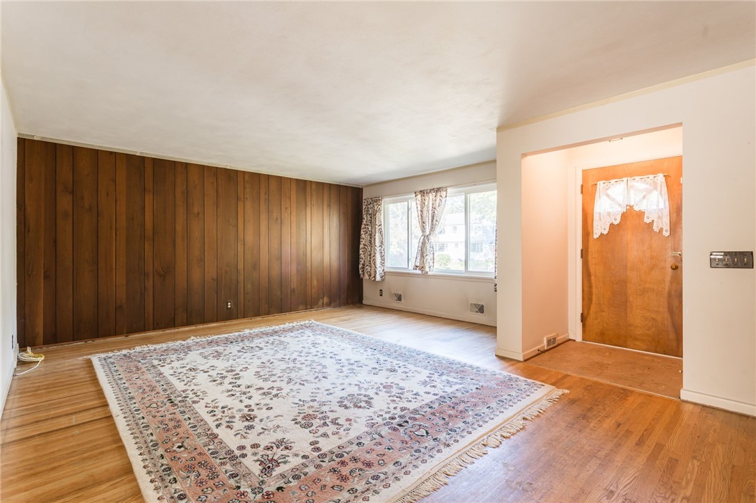 27 Angora Drive Irondequoit, NY 14617 - Photo 2 of 19 Front Foyer opens to spacious Living Room with har
