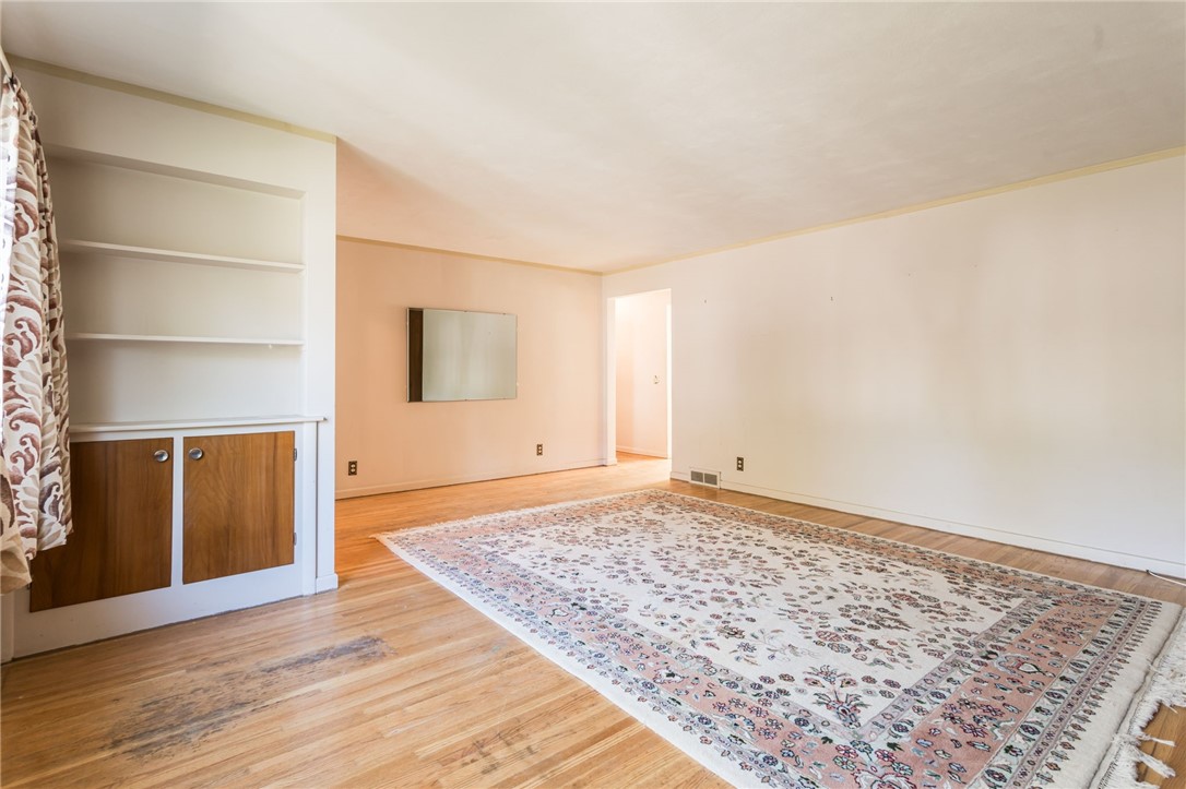 27 Angora Drive Irondequoit, NY 14617 - Photo 3 of 19 Built in bookcase in Living Room