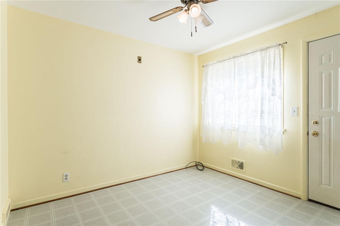 27 Angora Drive Irondequoit, NY 14617 - Photo 9 of 19 Eat-in area of the Kitchen with laminate flooring