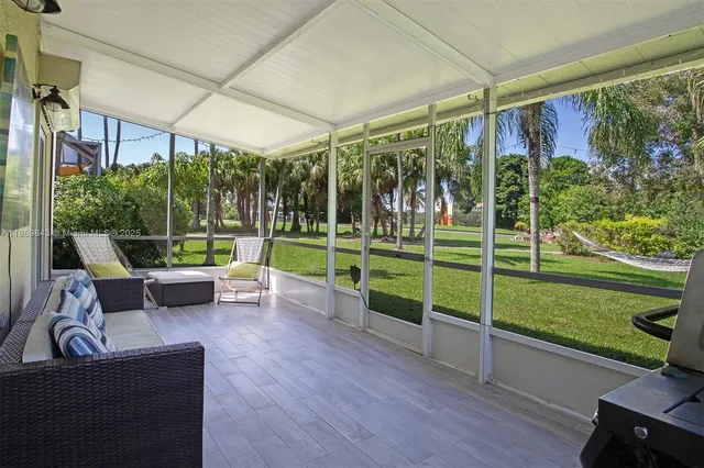 a house view with a sitting space and garden view