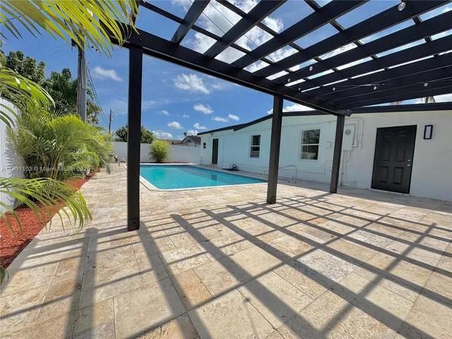 a view of a house with a garage