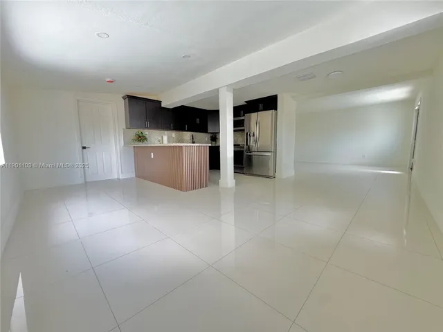 a view of a kitchen from a kitchen