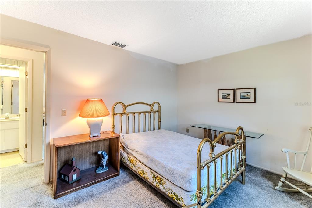 2193 Timber Lodge Lane Spring Hill, FL 34606 - Photo 40 of 73 a bedroom with a bed and a window