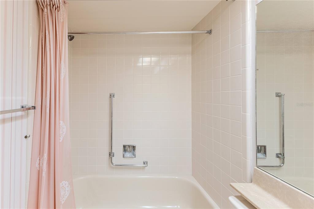 2193 Timber Lodge Lane Spring Hill, FL 34606 - Photo 45 of 73 a bathroom with a bathtub and a shower