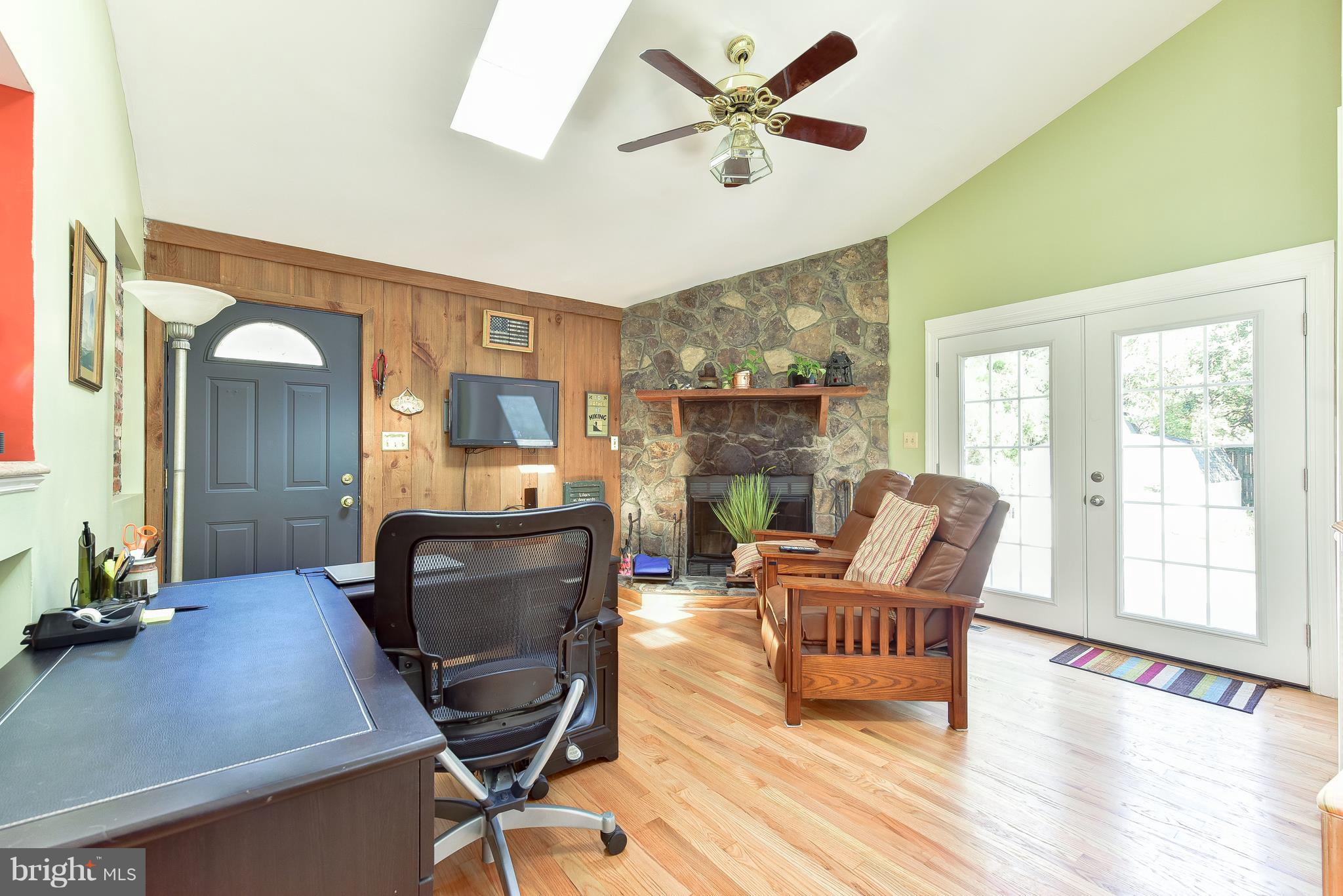 7923 Jackson Road Alexandria, VA 22308 - Photo 17 of 33 Great Room with beautiful stone fireplace