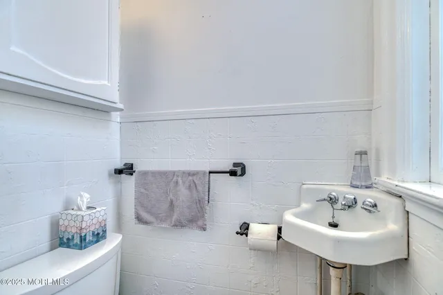 a view of a livingroom with furniture and window
