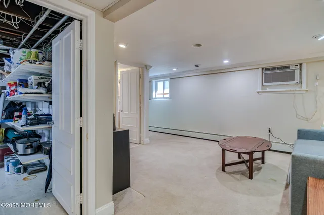 a bathroom with a shower and a sink