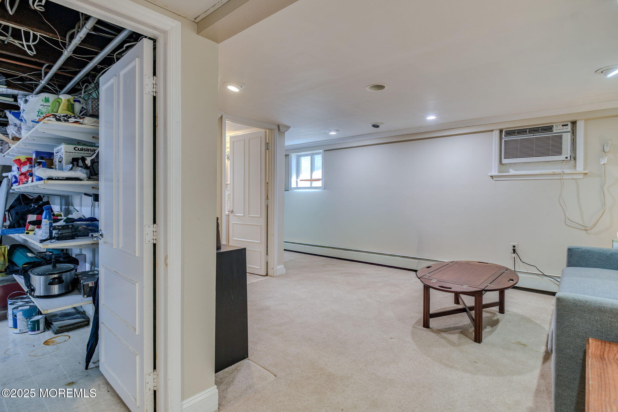 139 Cookman Avenue Ocean Grove, NJ 07756 - Photo 27 of 58 a view of a hallway with cabinet and closet