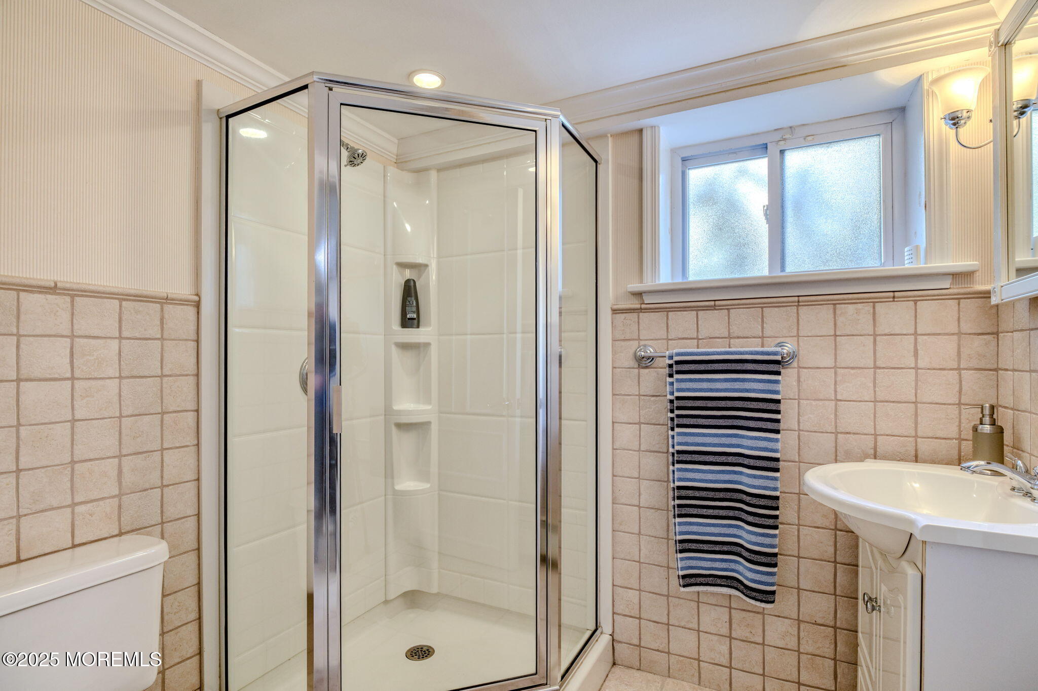 139 Cookman Avenue Ocean Grove, NJ 07756 - Photo 29 of 58 a bathroom with a shower and a sink