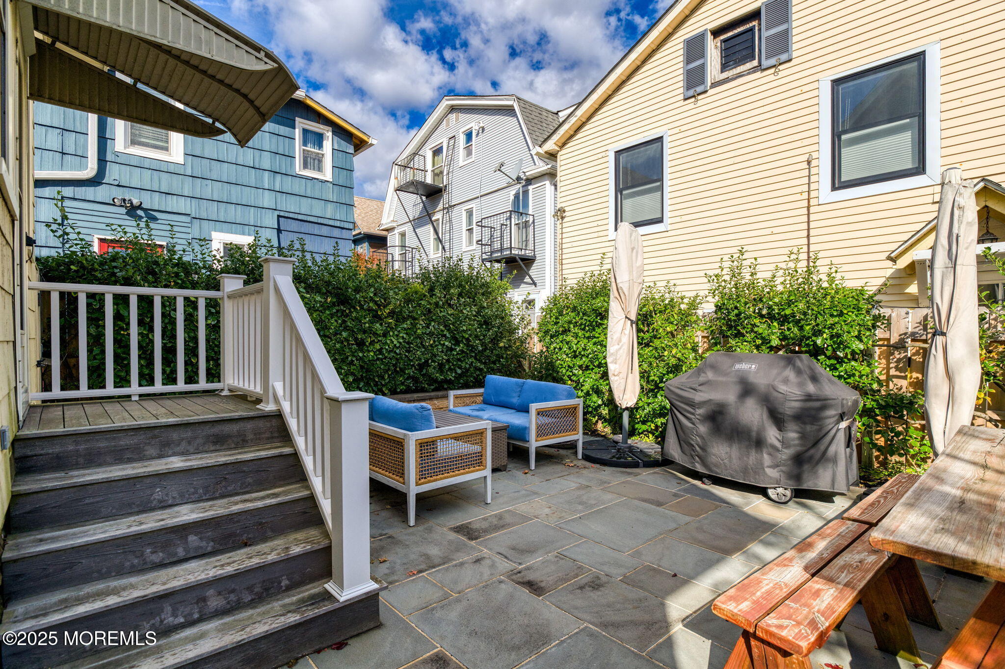 139 Cookman Avenue Ocean Grove, NJ 07756 - Photo 40 of 58 a view of backyard with outdoor seating and plants