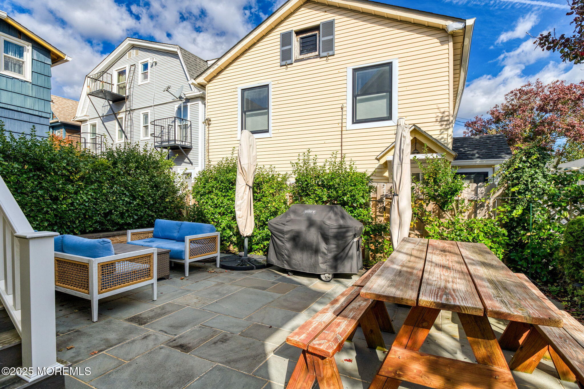 139 Cookman Avenue Ocean Grove, NJ 07756 - Photo 44 of 58 a view of backyard with outdoor seating and plants