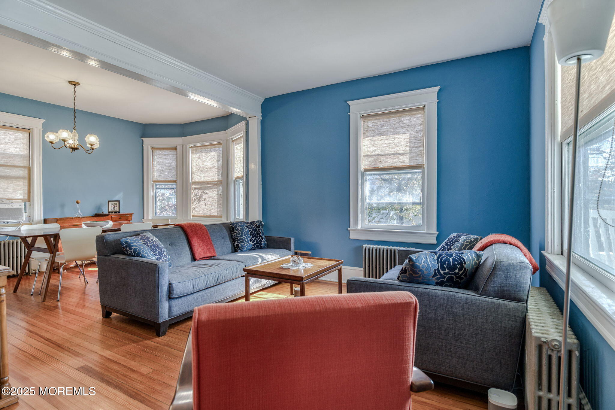 139 Cookman Avenue Ocean Grove, NJ 07756 - Photo 10 of 58 a living room with furniture and a window