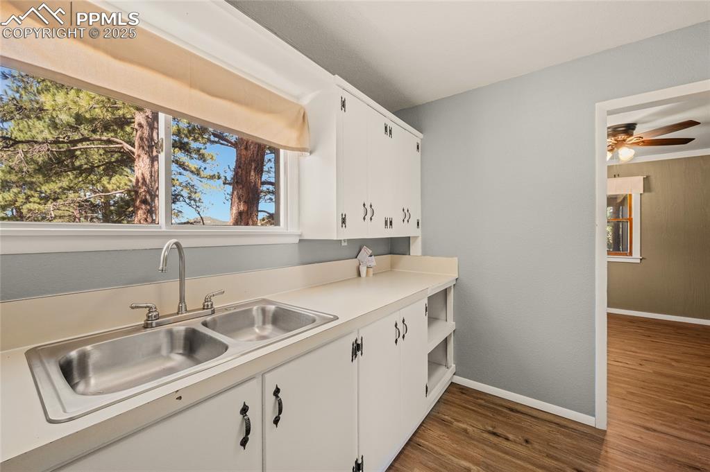 2925 M Path Cotopaxi, CO 81223 - Photo 21 of 27 a kitchen with a sink and a window