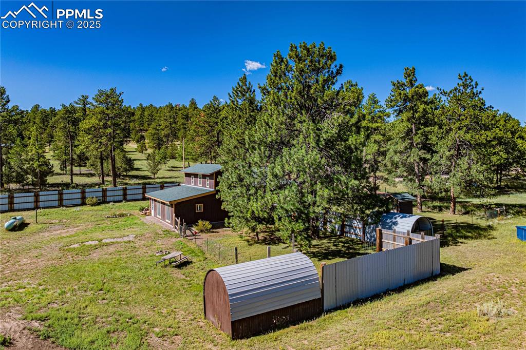 2925 M Path Cotopaxi, CO 81223 - Photo 26 of 27 a view of a swimming pool with a patio and a yard