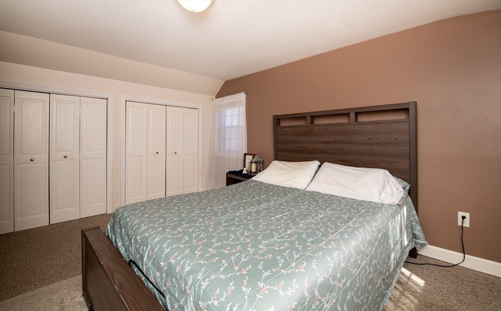 78 Precinct Street Taunton, MA 02718 - Photo 20 of 41 a bed sitting in a bedroom and closet
