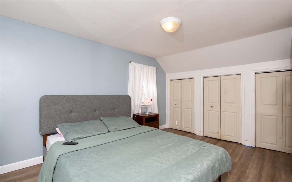 78 Precinct Street Taunton, MA 02718 - Photo 22 of 41 a bedroom with a bed and wooden floor