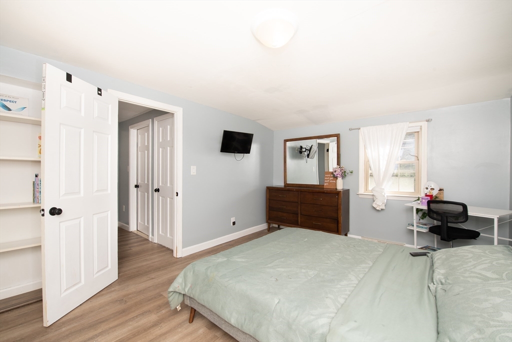 78 Precinct Street Taunton, MA 02718 - Photo 23 of 41 a bedroom with a bed and a couch