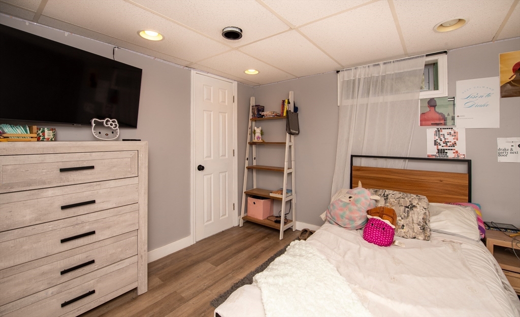 78 Precinct Street Taunton, MA 02718 - Photo 26 of 41 a bedroom with a bed and flat screen tv