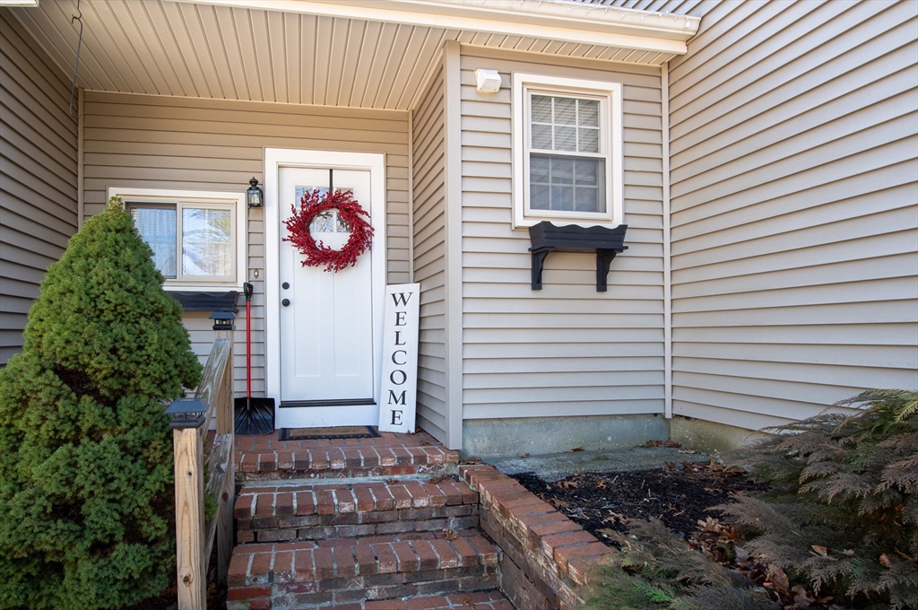 78 Precinct Street Taunton, MA 02718 - Photo 3 of 41 a view of a house with a door and a window