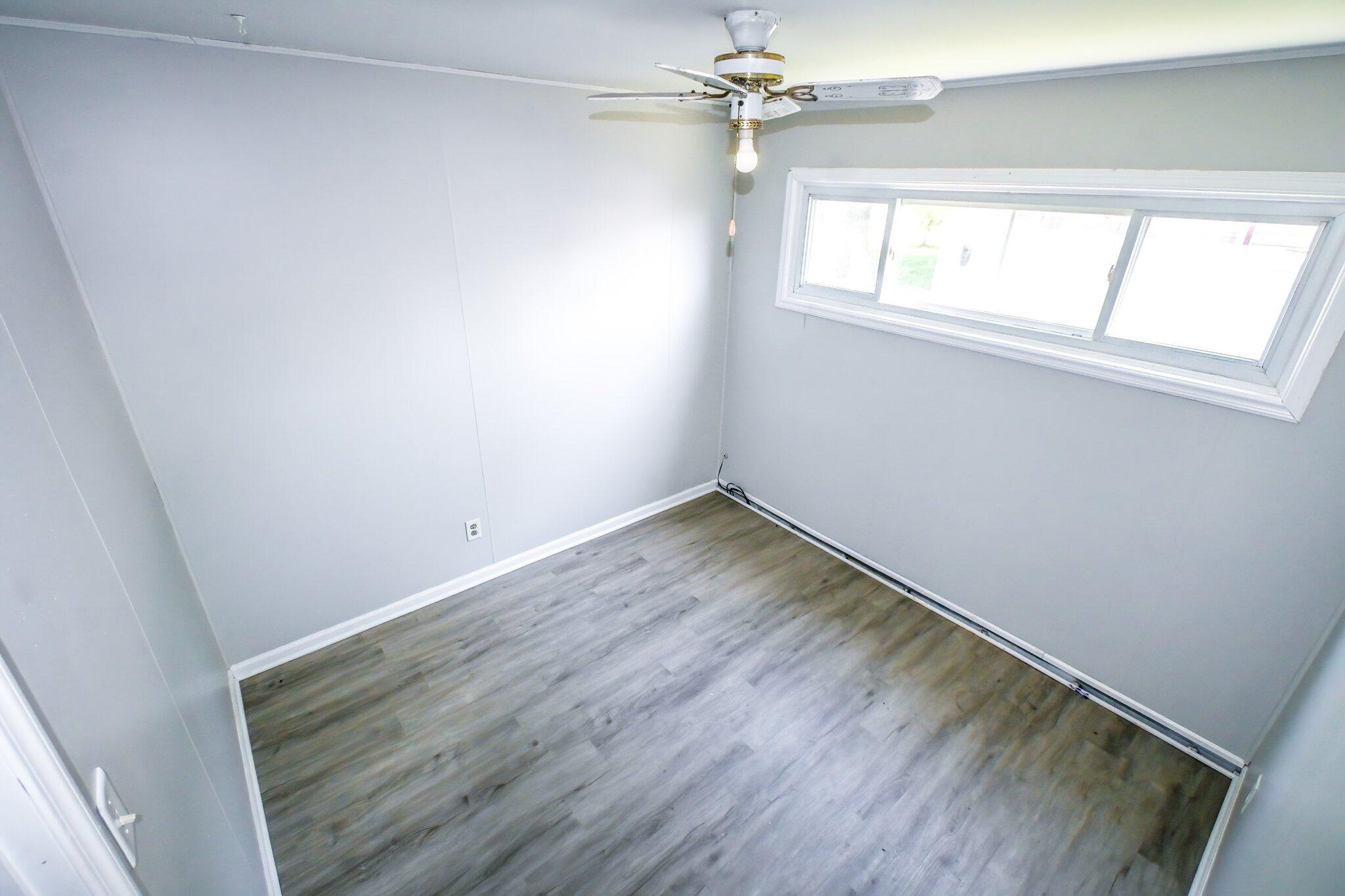 7828 Chestnut Avenue Hammond, IN 46324 - Photo 11 of 23 an empty room with a window